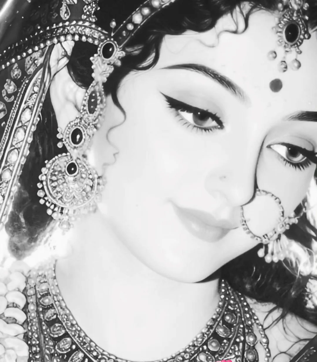 A stunning, serene portrait of Radha Rani. Her gentle gaze and soft smile radiate pure devotion and maternal love. Adorned in intricate jewe…